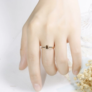 Detailed view of an octagonal smoky quartz ring on a hand with fine diamond accents