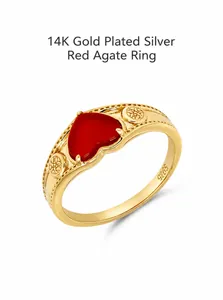 Detail of S925 sterling silver ring with 14K gold plating and red heart agate stone