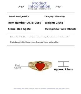 Detailed macro view of heart-shaped red agate ring with 14K gold plated silver texture