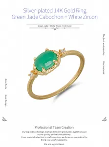 Macro shot of S925 stamp on a gold-plated silver ring with green chalcedony and zircon