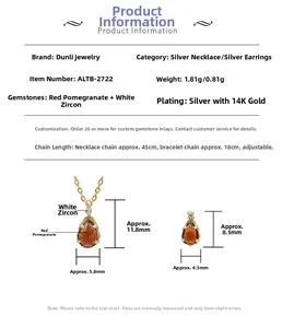 Macro detail of pear-cut garnet necklace and studs set in 14K gold plated silver