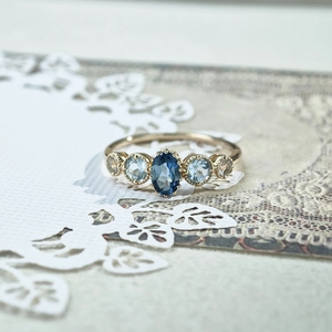 Vintage S925 silver ring with blue London Topaz and elegant milgrain detailing