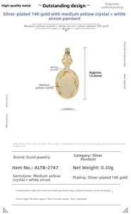 Detail van 14K vergulde zilveren hanger met ovale gele citrien en een kleine zirkonia