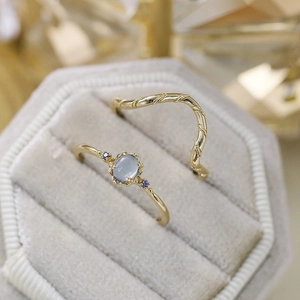 Elegant gold S925 silver aquamarine stacking ring set in a luxury velvet jewelry box