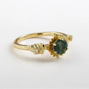 Detailed view of S925 silver sunflower ring with moss agate stone and leaf accents