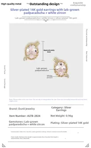 Detailed view of silver 14K gold plated earrings with pink Padparadscha and white zircon