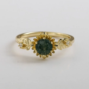 Elegant gold sunflower ring with round green moss agate and leaf-shaped side stones