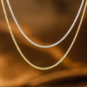 Sparkling S925 sterling silver twist chains in gold and silver finish on silk