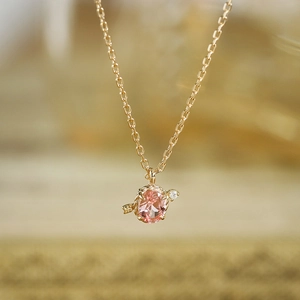 Pink sapphire cupid arrow necklace pendant in gold finish with elegant oval stone