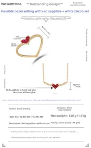 Detailed view of S925 silver heart ring and necklace set with ruby and zircon stones