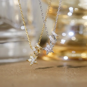 Collana con ciondolo a stella in argento S925 con cristalli di moissanite in oro e argento