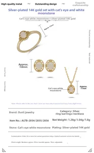 Λεπτομέρεια σετ κοσμημάτων από επιχρυσωμένο ασήμι 14Κ με φεγγαρόπετρα και φιλικράν σχέδιο