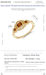 Detail eines Rings aus 925er Sterlingsilber mit rotem Granat und weißem Zirkon