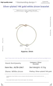 Detail of 14K gold plated silver horseshoe bracelet with white zircon and size specs