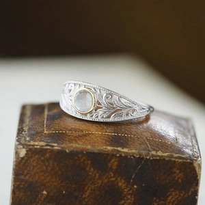 Vintage S925 silver lace ring with moonstone in an elegant retro jewelry box