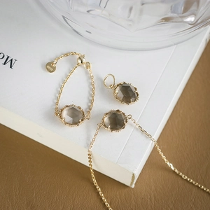 Conjunto joyas S925 plata bañada en oro con cuarzo ahumado y anillo ajustable