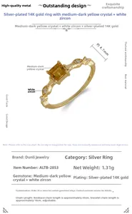 Close-up of S925 silver ring with square yellow citrine and 14K gold plating