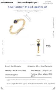 Details van S925 zilveren 14k gouden ring en sleutelhanger met blauwe korund