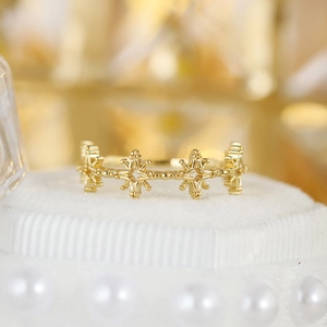 Lace style S925 silver ring with 14k gold plating and white zircon hollow star pattern
