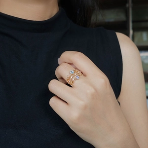 Close-up of S925 silver 14k gold plated lace rings with heart-shaped zircon stones