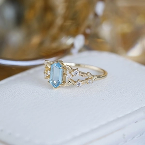Luxurious S925 silver 14K gold plated ring with London Blue Topaz and leaf design