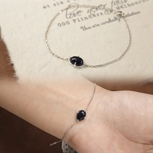 S925 sterling silver bracelet with oval blue sandstone pendant in a minimalist claw setting