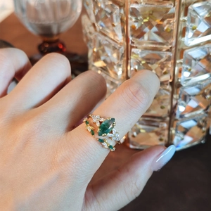 Vintage gold s925 silver ring set with marquise green agate stone on model hand