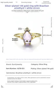 Detail van s925 zilveren ring met 12mm druppelvormige amethist en witte zirkonia-stenen
