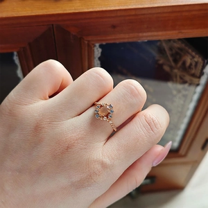 Bague vintage en argent S925 plaqué or avec pierre de lune orange et gemmes bleues