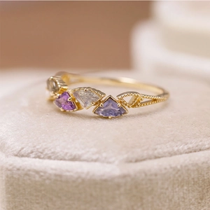 Elegant gold-plated silver ring featuring triangular labradortie and iolite gemstones