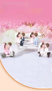 Detail showing various PVC cartoon couple miniatures with umbrellas and benches