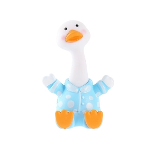 Cute white duckling figurine wearing blue polka dot pajamas for desk or car decoration