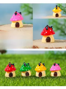 Detailed macro view of colorful miniature resin mushroom houses for moss landscapes