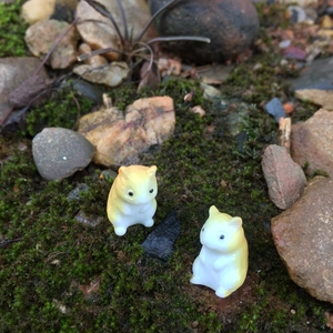 Two cute hamster resin figurines for miniature landscapes on moss background