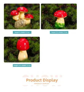 Detailed view of three miniature resin mushrooms with red caps and white spots for terrariums