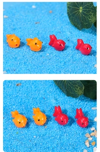 Detailed macro view of orange and red resin goldfish miniature for aquarium landscaping