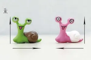 Detailed view showing dimensions of cute pink and green PVC snail miniature figurines