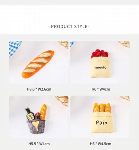 Detailed view of resin baguette and picnic basket miniature food charms for DIY crafts