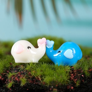 Mini resin elephant figurines in white and blue with heart details for succulent decor