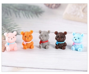 Detail view of five resin bears with scarf and corduroy texture for fairy garden decor