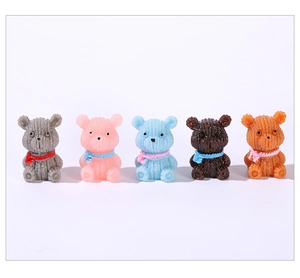 Set of five resin miniature bears with knit textures and colorful scarves for gardening