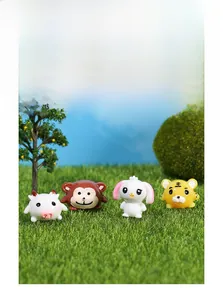 Miniature resin cartoon animal figures featuring a tiger, monkey, rabbit, and ox set