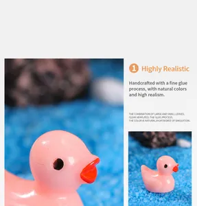 Detail of pink resin duck miniature with glossy finish for succulent garden decoration