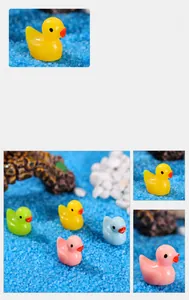 Miniature resin ducks in yellow, green, pink, and blue for terrarium decor