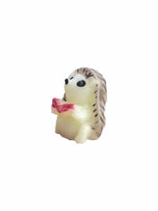 Cute resin hedgehog figurine holding a pink heart for succulent micro landscape decor