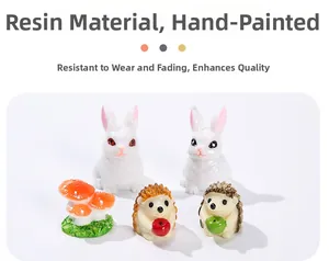 Detail of hand-painted resin micro landscape set with cute rabbits, hedgehogs and mushrooms