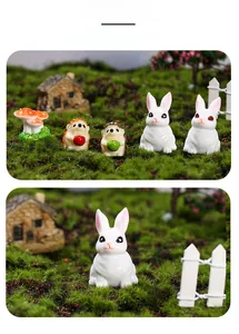 Miniature resin garden figurines set featuring white rabbits, hedgehogs, and mushrooms