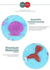 Detail showing purple shell and red fishtail resin crafts with rhombic textures on blue sand