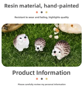 Detailed view of three resin hedgehog figurines with hand-painted textures for terrariums