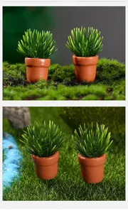 Macro view of miniature evergreen plants in reddish-brown pots for dollhouse landscapes